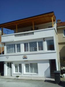 a white building with a lot of windows at Casa Branca in Sozopol
