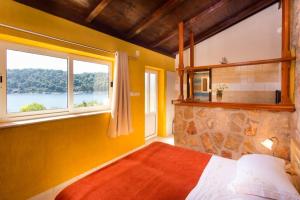 Postel nebo postele na pokoji v ubytování Guest House Simunovic