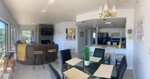 a kitchen and living room with a dining room at River Place Condos #711 3BD in Pigeon Forge