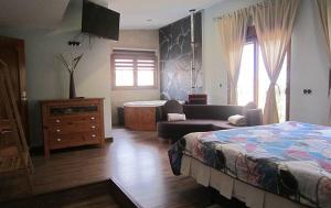 Postel nebo postele na pokoji v ubytování Chalet de Lujo en La Manga + 16 fotografií