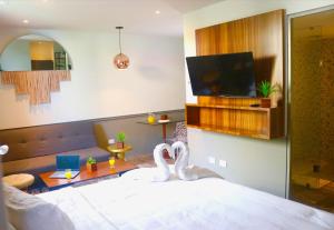 Ένα ή περισσότερα κρεβάτια σε δωμάτιο στο Singular Joy Vacation Rentals
