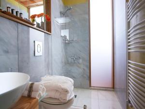 a bathroom with a sink and a toilet and a shower at Dorotheou House in Chania +40 photos