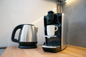 Příslušenství pro přípravu čaje a kávy v ubytování Ubytování na samotě - Apartmán U Tesařů