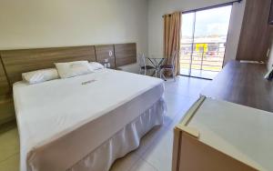 מיטה או מיטות בחדר ב-Hotel Vale da Serra