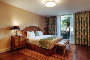 Ένα ή περισσότερα κρεβάτια σε δωμάτιο στο Hotel Reggia Catarina