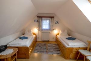 Postelja oz. postelje v sobi nastanitve Gasthof Kirchmoar