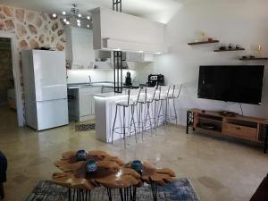 a kitchen with a table with donuts on it at Sea view Bougainvillea 52 in Kalkan