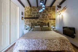 Postel nebo postele na pokoji v ubytování Casa Nazarí - Setenil de las Bodegas