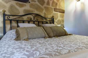 Postel nebo postele na pokoji v ubytování Casa Nazarí - Setenil de las Bodegas