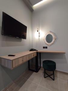 TV a/nebo společenská místnost v ubytování Stefani apartments