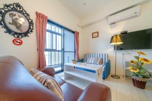 TV a/nebo společenská místnost v ubytování Hui Yun B&B