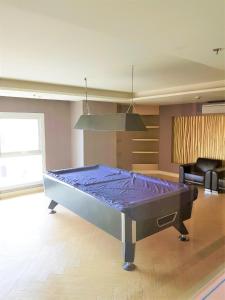 Postel nebo postele na pokoji v ubytování Grand Caribbean resort Pattaya 1 bedroom 4th floor