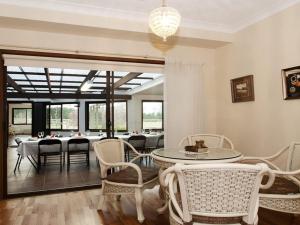 a dining room with a table and chairs at Hope in Exeter