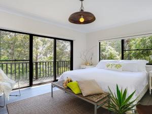 A bed or beds in a room at Bellara - your home among the gum trees!