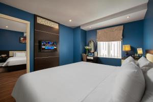 Ένα ή περισσότερα κρεβάτια σε δωμάτιο στο Hanoi 20 Hotel & Apartment