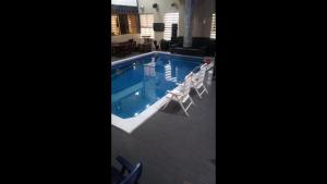 Uma vista da piscina em Room in Lodge - Cynergy Suites Royale, Lekki ou nos arredores