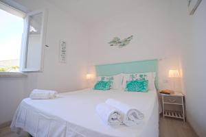 A bed or beds in a room at Villa Manzoni