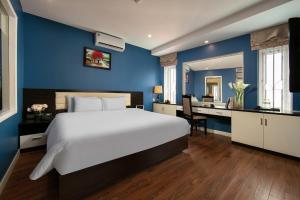 Ένα ή περισσότερα κρεβάτια σε δωμάτιο στο Hanoi 20 Hotel & Apartment