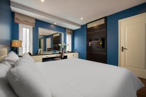 Ένα ή περισσότερα κρεβάτια σε δωμάτιο στο Hanoi 20 Hotel & Apartment