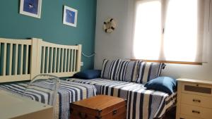A bed or beds in a room at Attic apartment in Vera Beach with wifi and air-conditioning