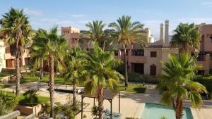 The swimming pool at or close to Attic apartment in Vera Beach with wifi and air-conditioning
