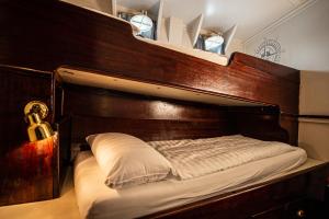 Postel nebo postele na pokoji v ubytování Das Feuerschiff