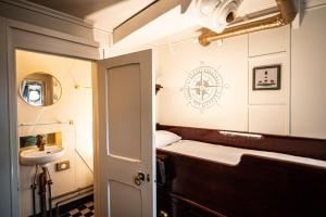 Postel nebo postele na pokoji v ubytování Das Feuerschiff