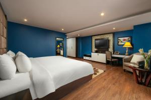 Ένα ή περισσότερα κρεβάτια σε δωμάτιο στο Hanoi 20 Hotel & Apartment
