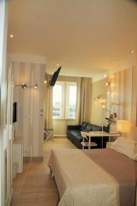 Postel nebo postele na pokoji v ubytování B&B Pescara Centro Luxury Suite