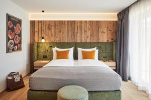 Voodi või voodid majutusasutuse Hotel Marmolada toas