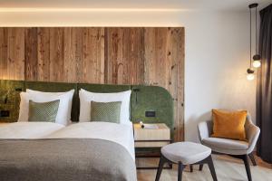 Voodi või voodid majutusasutuse Hotel Marmolada toas
