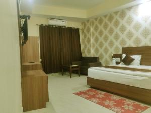 Hotel The Vaishno Devi Hills客房内的一张或多张床位