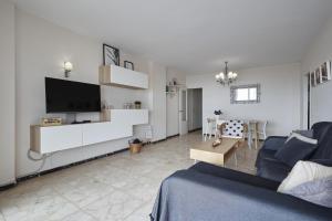 TV a/nebo společenská místnost v ubytování Apartamento Boliches