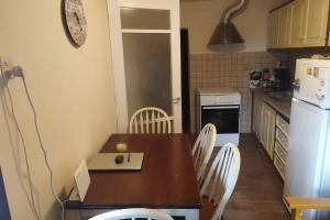 Kuchyň nebo kuchyňský kout v ubytování Maro's Guesthouse