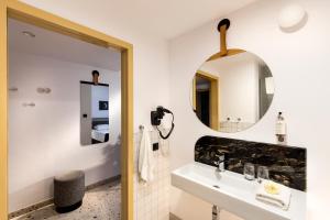 Koupelna v ubytování Antares Hotel
