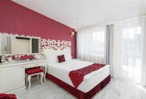 Postel nebo postele na pokoji v ubytování Dream Bosphorus Hotel