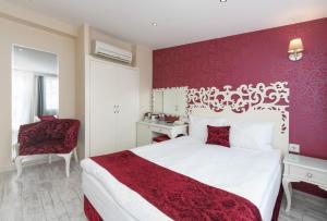 Postel nebo postele na pokoji v ubytování Dream Bosphorus Hotel