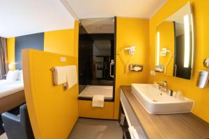 Koupelna v ubytování City Hotel Gouda, WorldHotels Crafted Collection