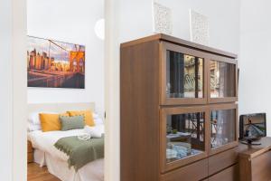 Postel nebo postele na pokoji v ubytování Stay U-nique Apartments Balmes