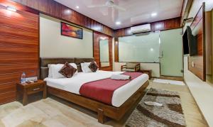 Ліжко або ліжка в номері Hotel Shree Daan