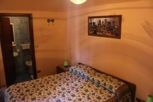 Postel nebo postele na pokoji v ubytování Locanda monte cervino