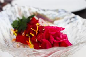 a pile of red peppers on a piece of tin foil at Europe Villa Cortes GL in Playa de las Americas