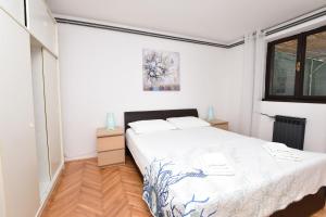 Postel nebo postele na pokoji v ubytování Apartment Ivan