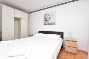 Postel nebo postele na pokoji v ubytování Apartment Ivan