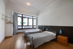 Posteľ alebo postele v izbe v ubytovaní Kontxa Guesthouse + 15 fotografií