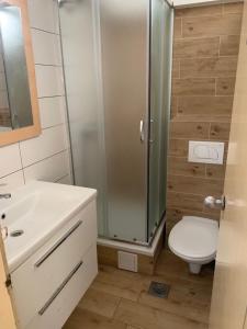 Et badeværelse på Rooms Garden