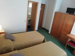 Postelja oz. postelje v sobi nastanitve Hotel Crimea