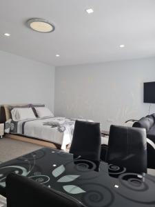 Katil atau katil-katil dalam bilik di Birutės apartamentai