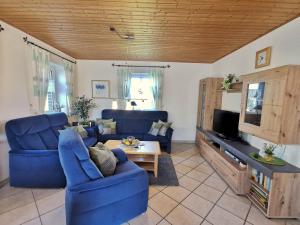 Μια τηλεόραση ή/και κέντρο ψυχαγωγίας στο Ferienhaus Scharhörn