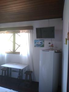 Dapur atau dapur kecil di Pousada Recanto dos Pássaros